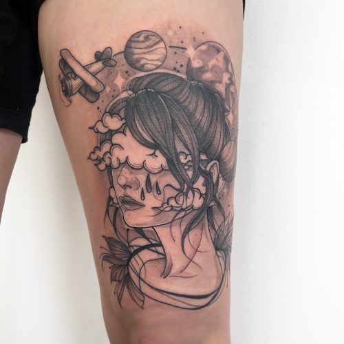 Tattoo von Charmaine Désirée Tattoo auf dem Oberschenkel